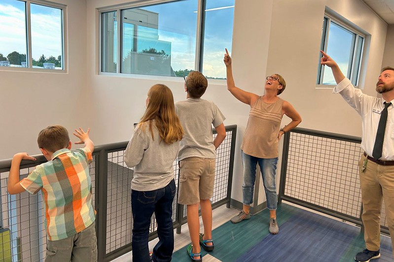Families take a look at the new facility at Atlas Preparatory School at the recent unveiling.