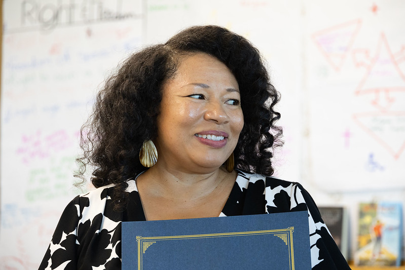 Photo of Janet Damon receiving her Colorado Teacher of the Year finalist award.